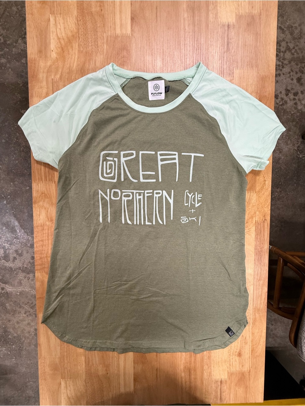 Flylow Olive and Mint Raglan Graphic Tee - Great Northern Mountain Bile shirt